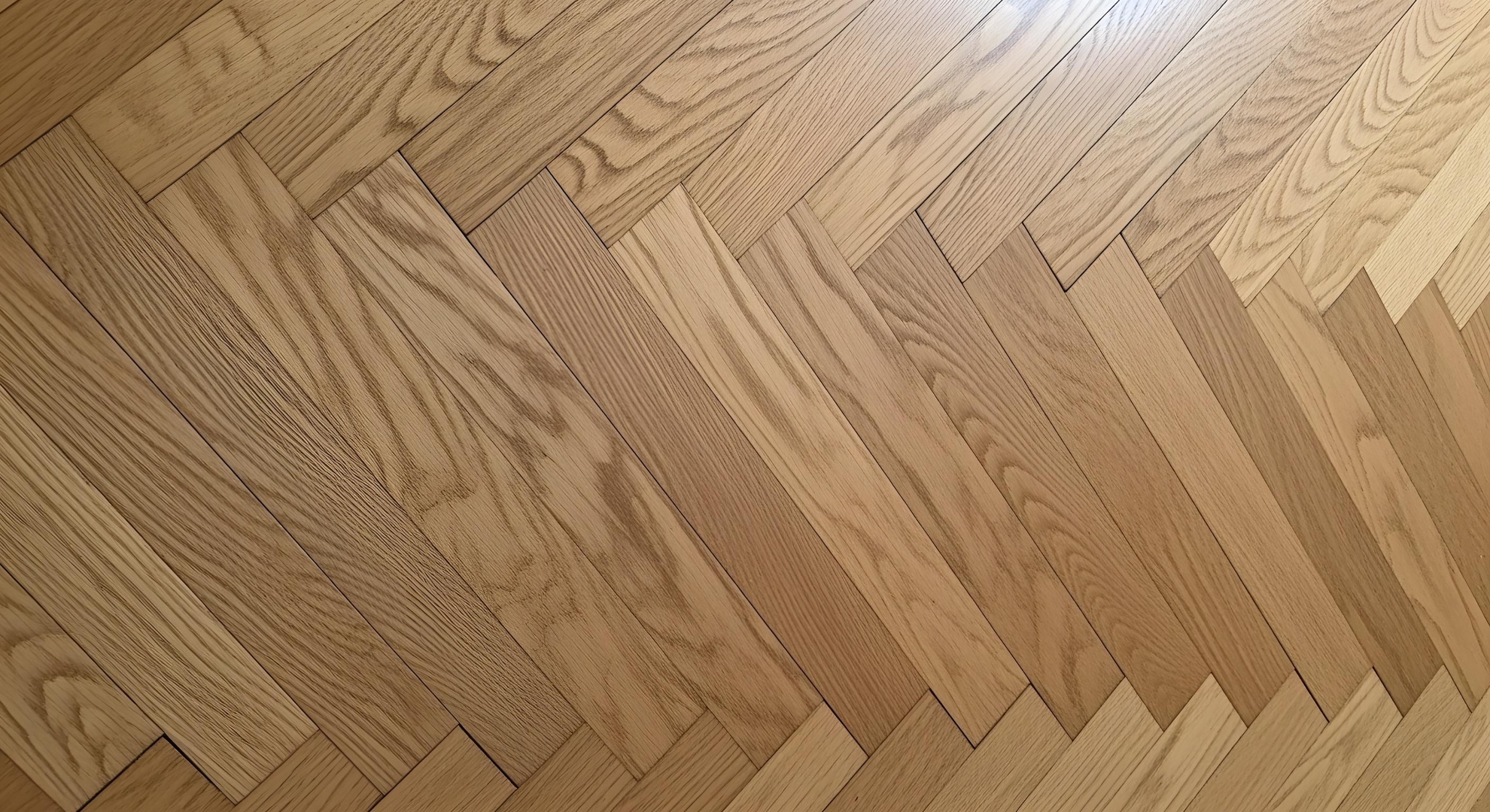 Herringbone parquet flooring installation — Arnautu Keramik Basel